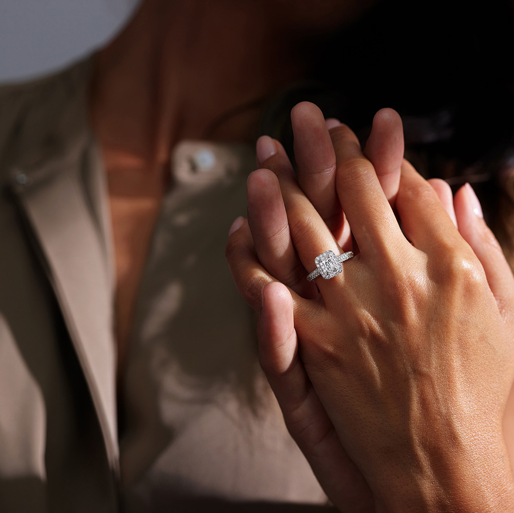 LEO diamond ring on woman's hand